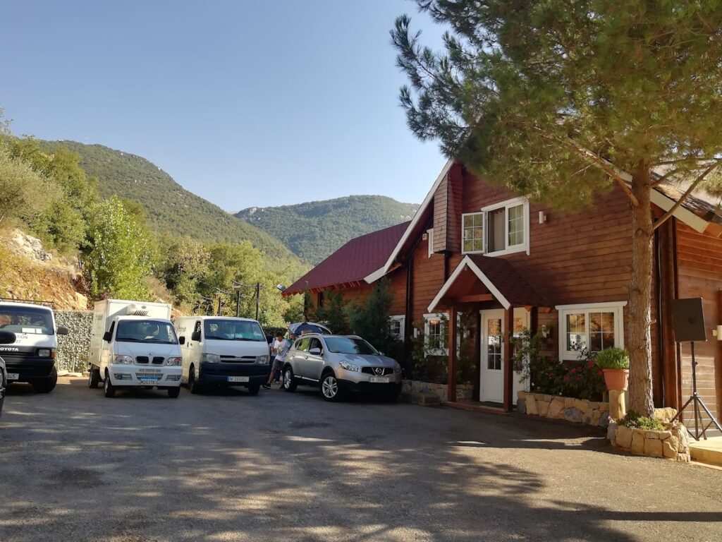 a house with cars parked in front of it