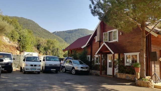 a house with cars parked in front of it