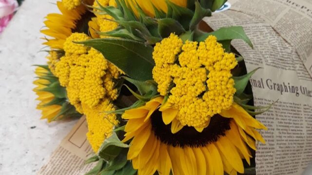 a bouquet of sunflowers on a table