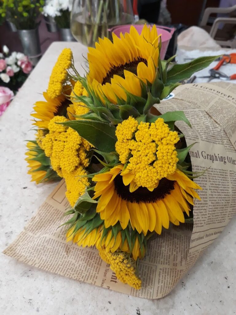 a bouquet of sunflowers on a table