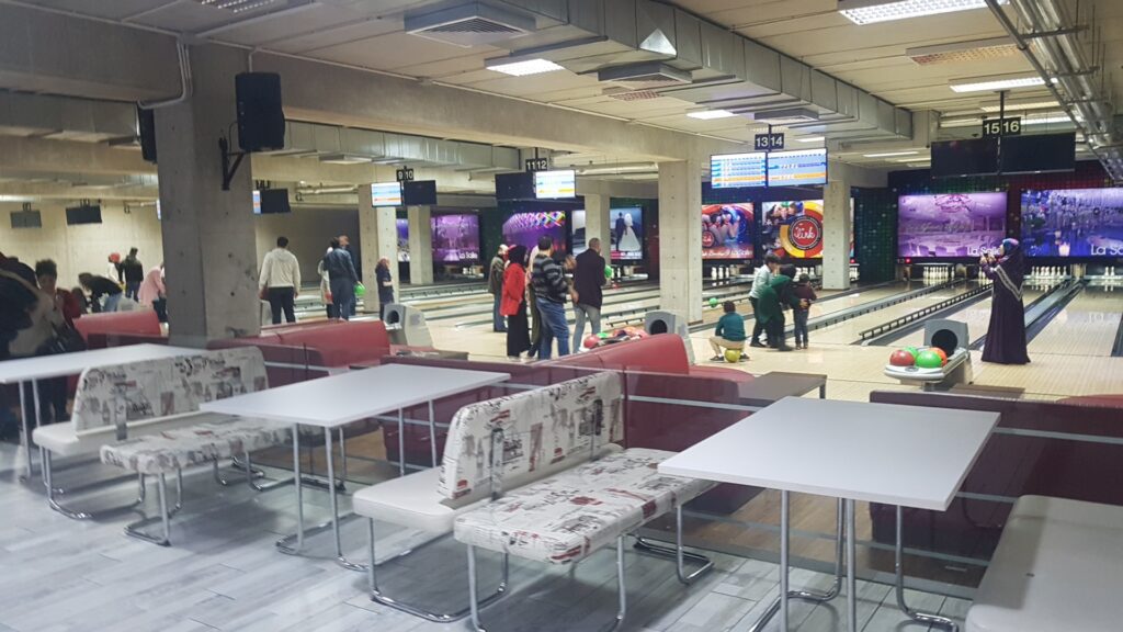 people around a bowling alley