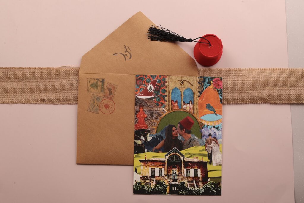 a card and a cap on a brown envelope