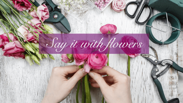 a person holding a bouquet of flowers