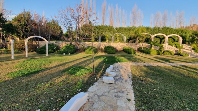 a stone walkway in a park