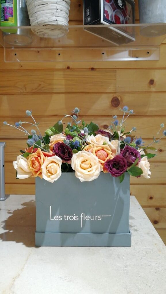 a box of flowers on a table