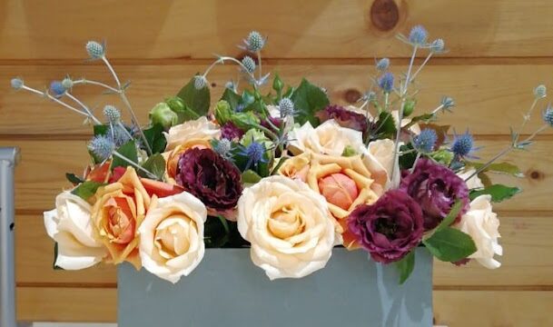 a box of flowers on a table