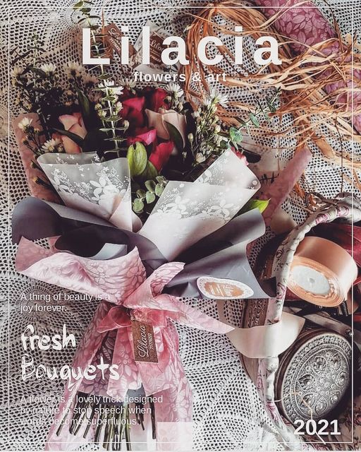 a magazine cover with a bouquet of flowers