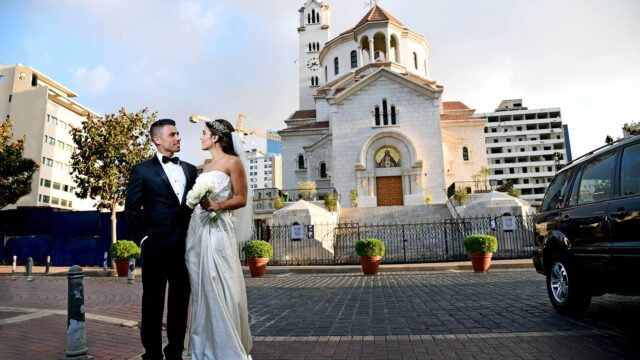 a man and woman in wedding attire