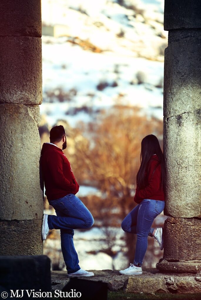 a man and woman standing in a doorway