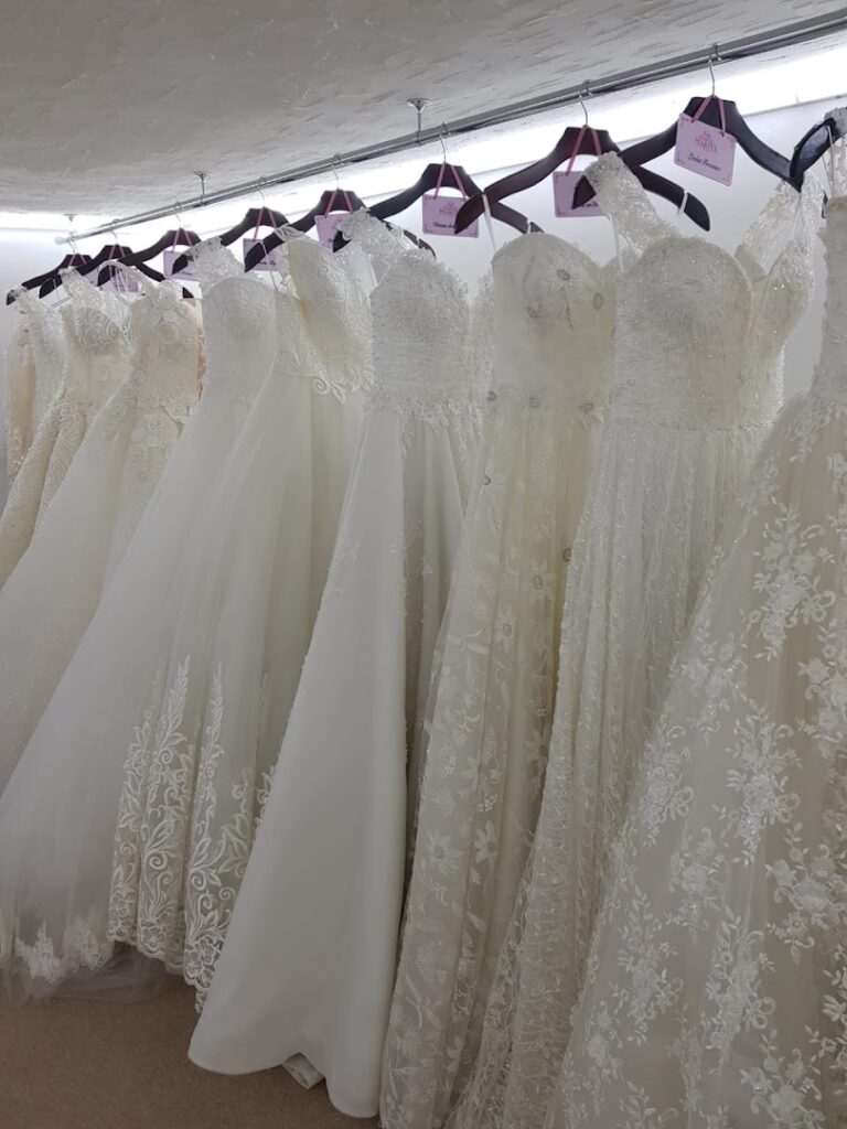 a group of wedding dresses on swingers