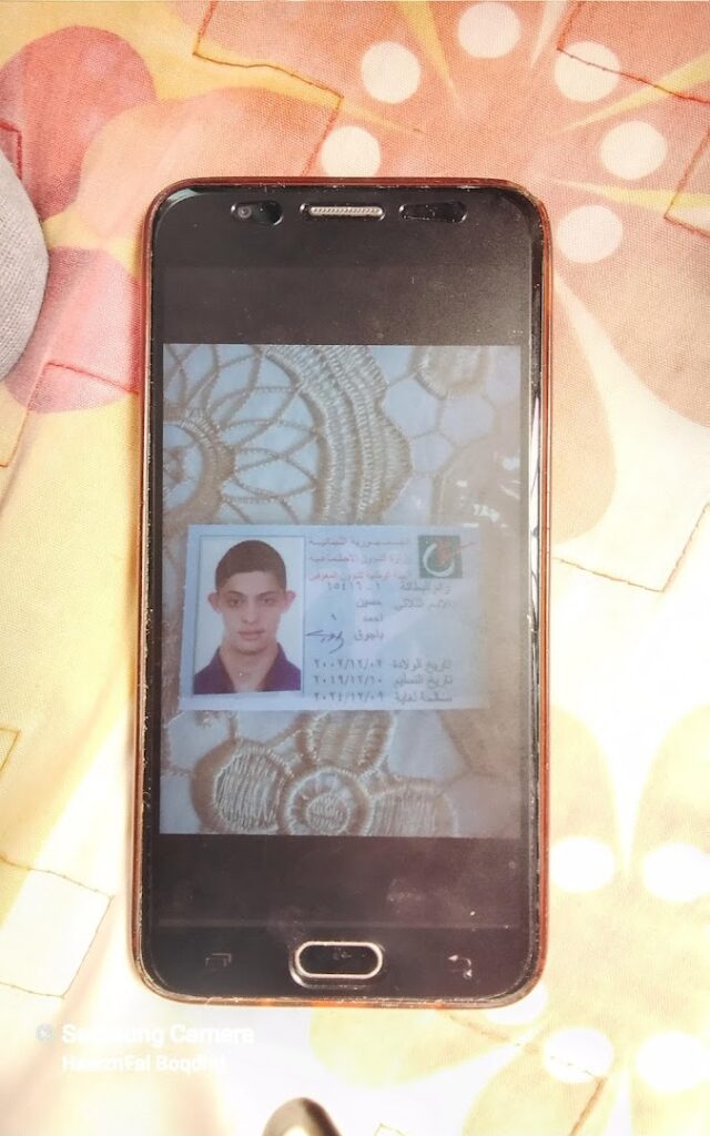 a cell phone with a picture of a man on it