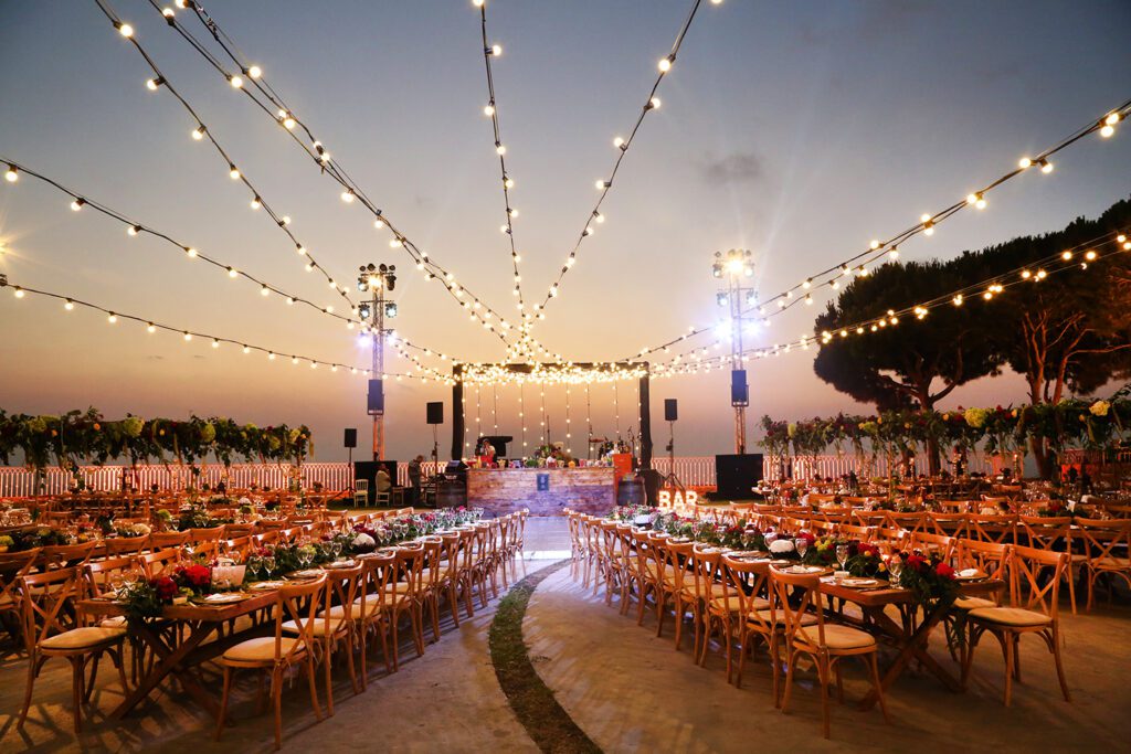 a group of tables set up for a wedding