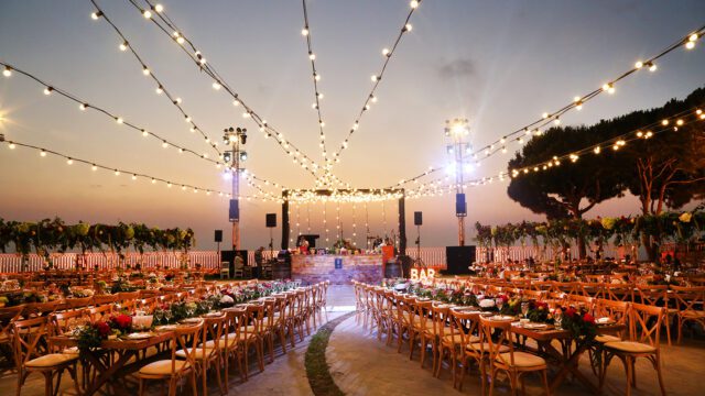 a group of tables set up for a wedding