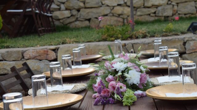 a table with plates and glasses on it