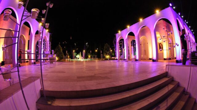 a building with purple lights