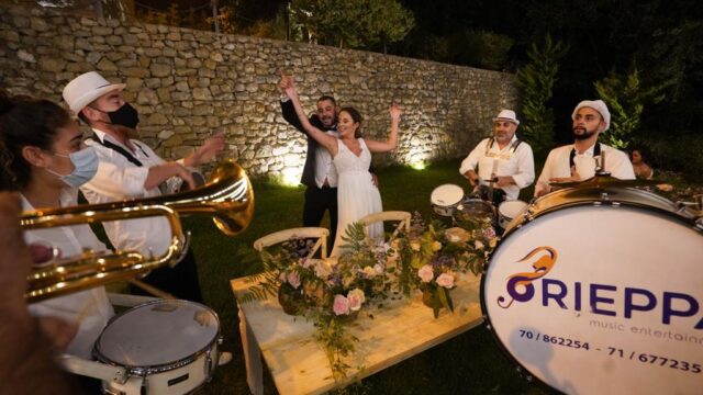 a group of people playing instruments outside