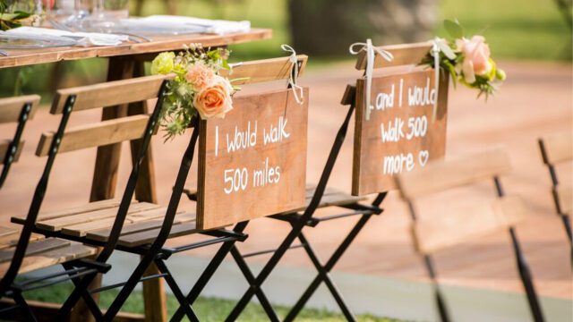 a group of chairs with signs on them