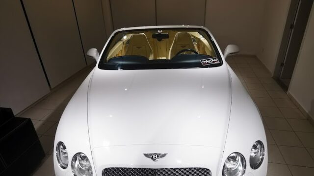 a white car parked in a garage