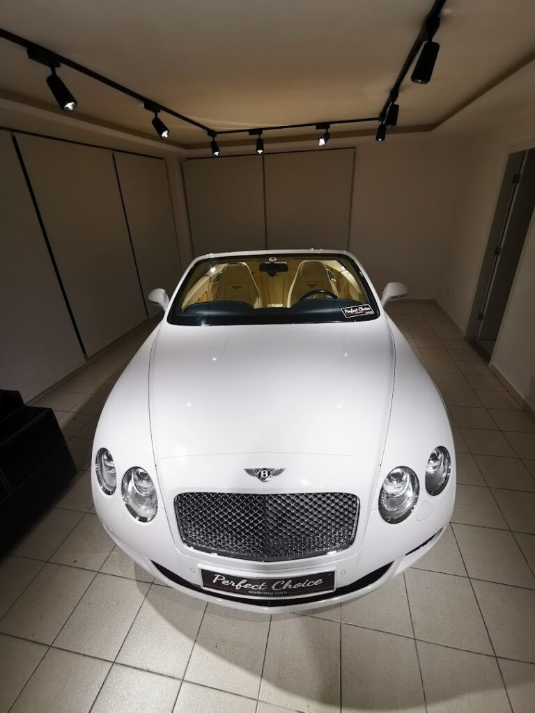 a white car parked in a garage