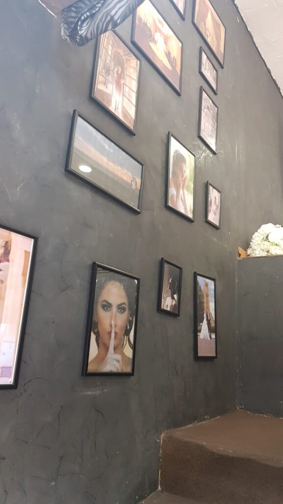 a wall with pictures on it