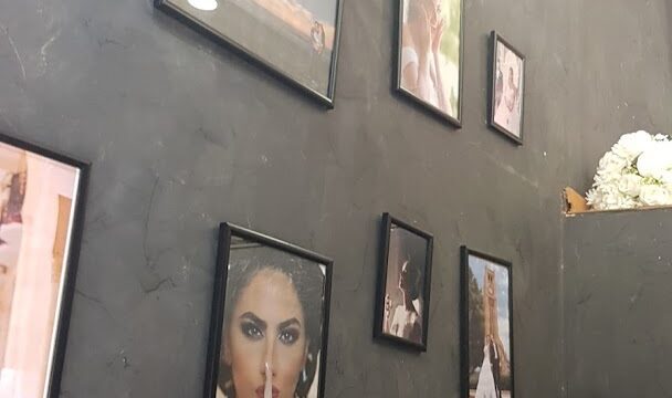 a wall with pictures on it