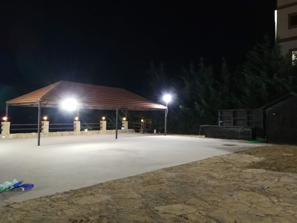 a gazebo with lights at night