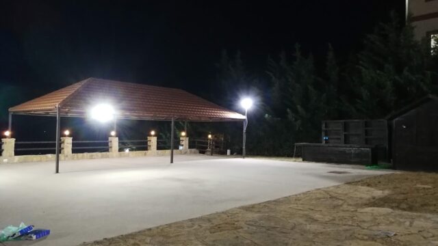 a gazebo with lights at night