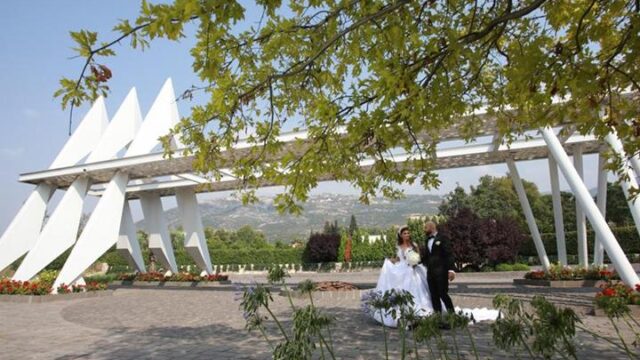 a man and woman in wedding attire