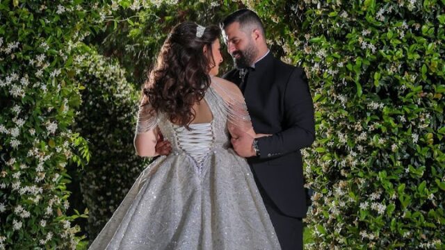 a man and woman in a wedding dress