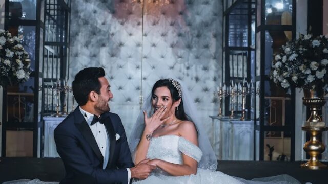 a man in a suit and a woman in a wedding dress