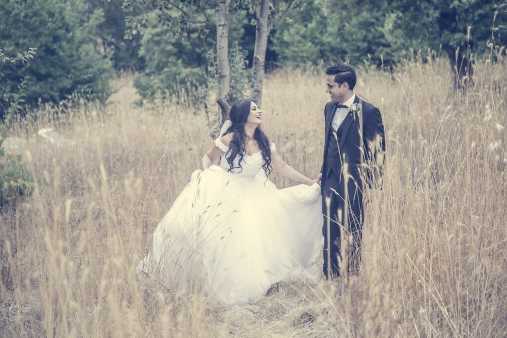 a man and woman in a field