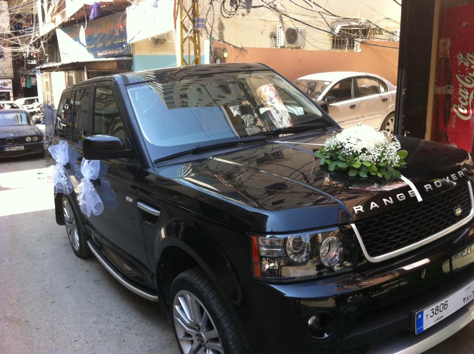 a car with flowers on the hood