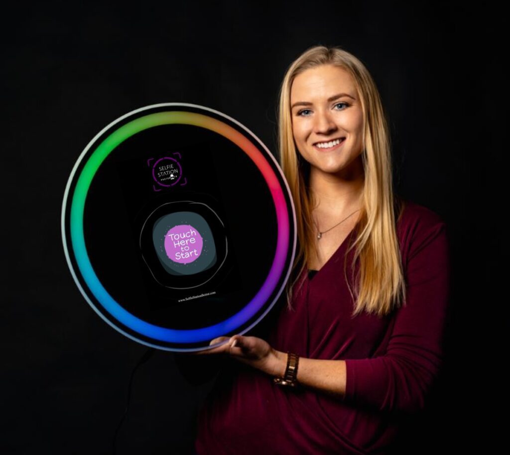 a woman holding a circular object