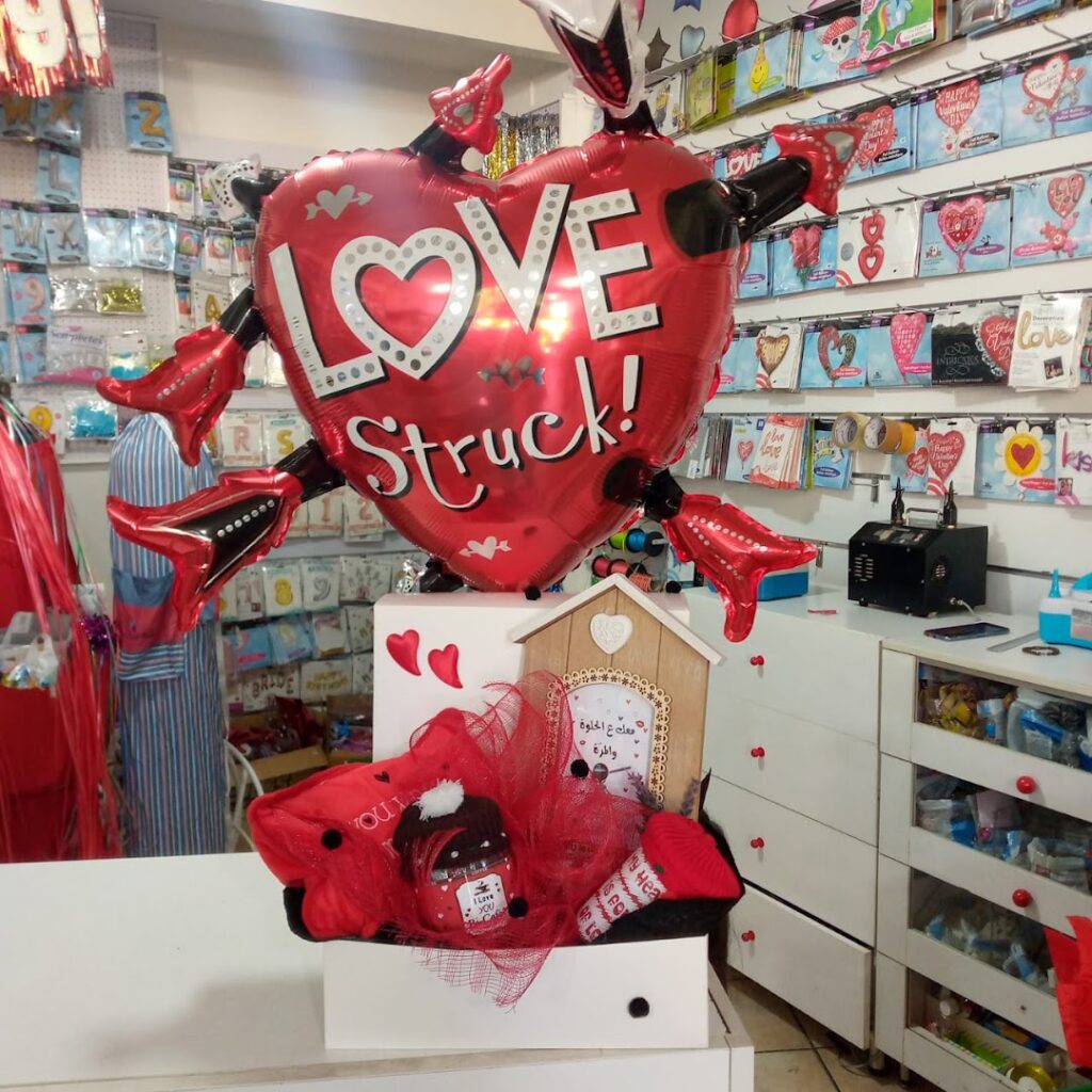 a heart shaped balloon in a store