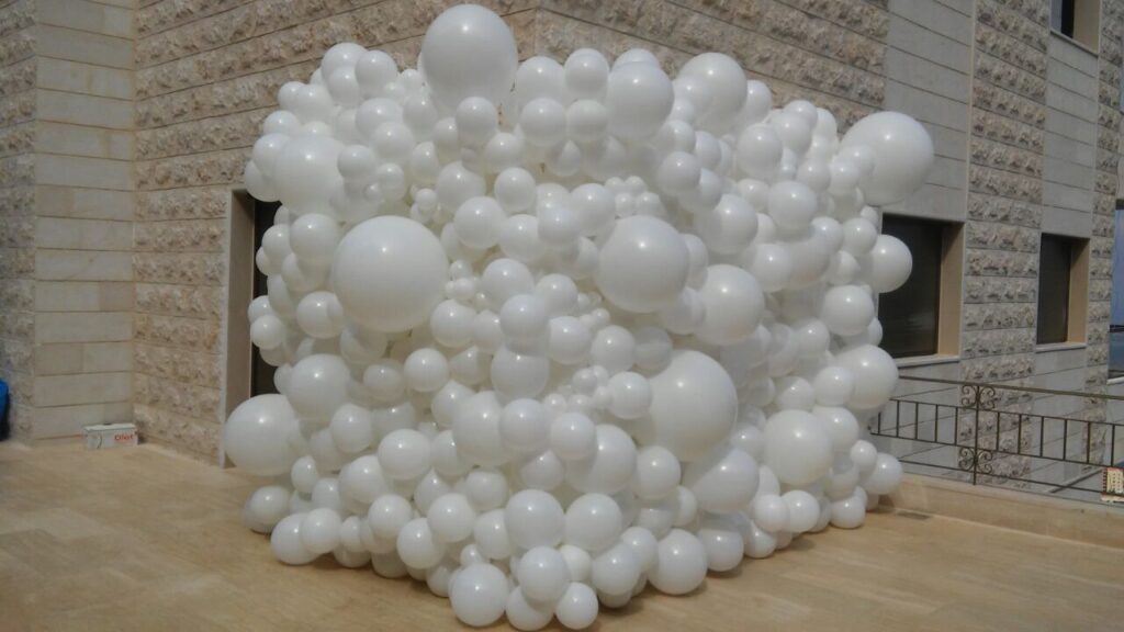 a large white balloon sculpture