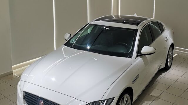 a white car in a showroom