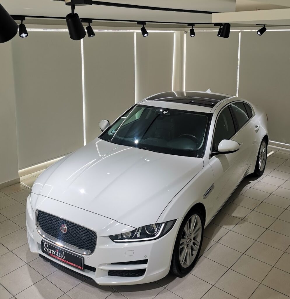 a white car in a showroom