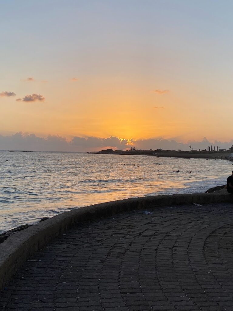 a sunset over a body of water