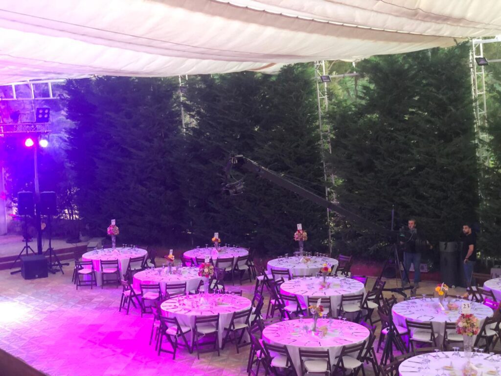 a group of tables set up in a tent