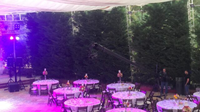 a group of tables set up in a tent