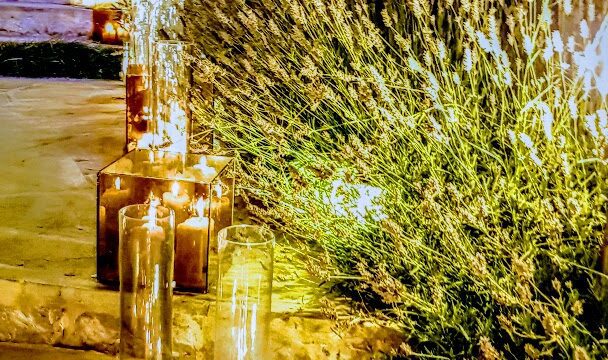 candles in glass jars on steps