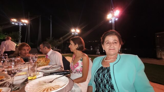 a group of people sitting at a table