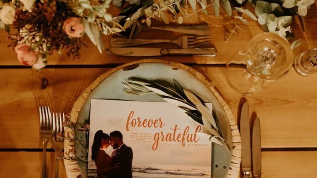 a table with a picture of two people on a plate