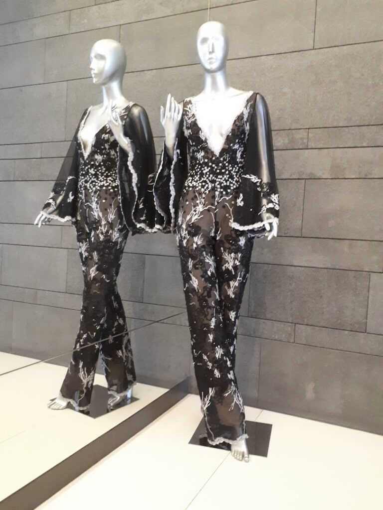 two mannequins wearing dresses