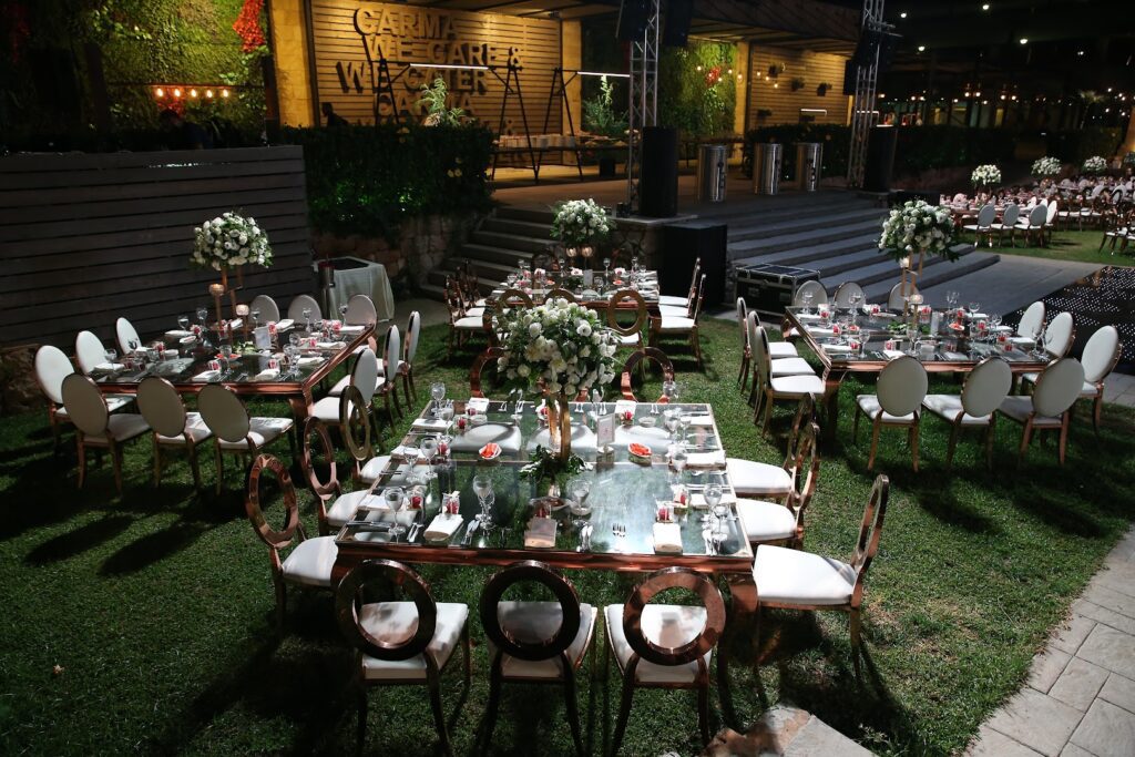 a group of tables set up in a yard