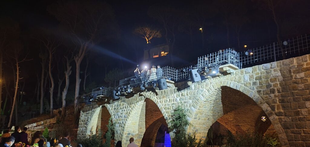 a group of people on a bridge