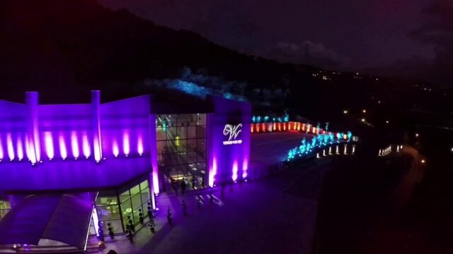 a building with purple lights