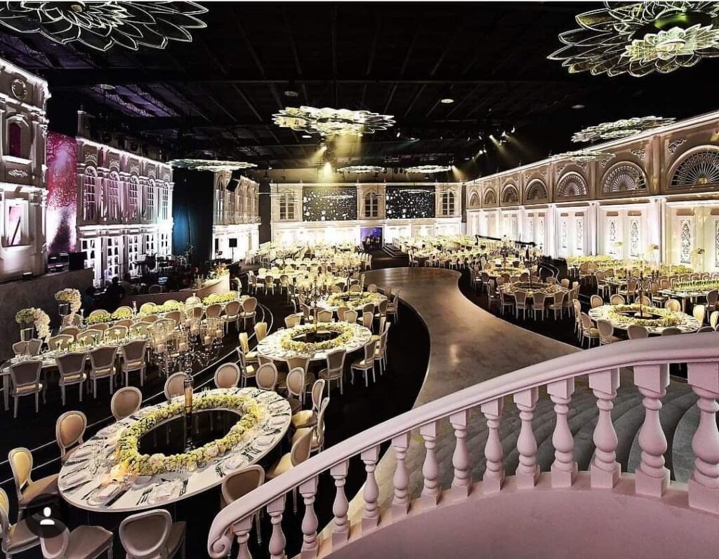 a large ballroom with tables and chairs