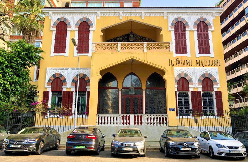 a building with cars parked in front of it