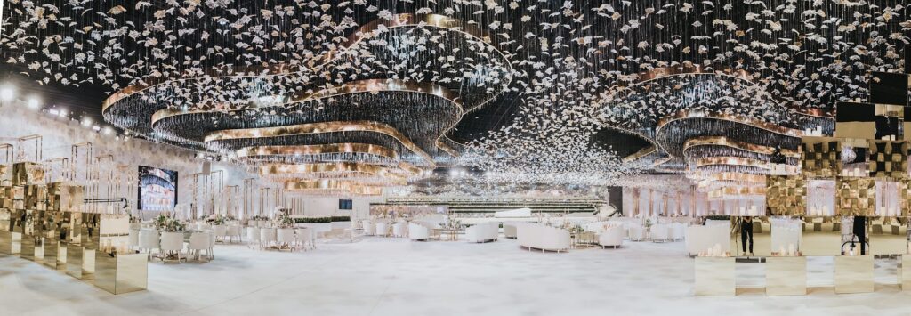 a room with white furniture and white chairs